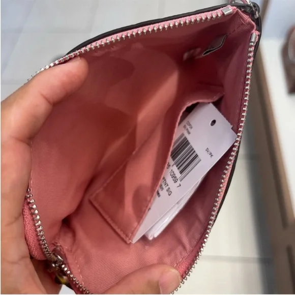 Coach Corner Zip Wristlet In Signature
Leather With Heart Charm - Picture 6 of 6